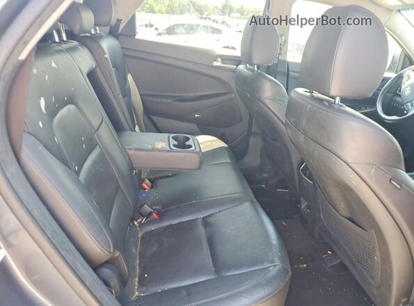 KM8J33AL2KU970350 2019 HYUNDAI TUCSON Gray უკანა სალონის ხედი