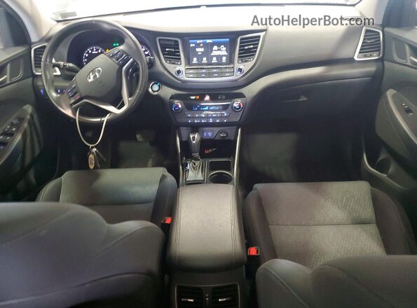 KM8J3CA20JU823336 2018 HYUNDAI TUCSON Gray ხელსაწყოთა პანელის ხედი