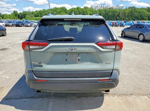 JTMW1RFV2KD003248 2019 TOYOTA RAV4 Gray Front interior view