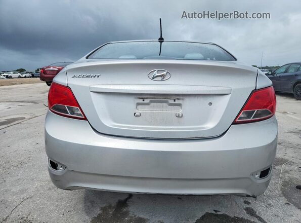KMHCT4AE4GU942685 2016 HYUNDAI ACCENT Silver Front interior view