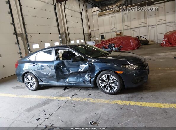 19XFC1F30HE205040 2017 HONDA CIVIC Синий Вид задней части салона