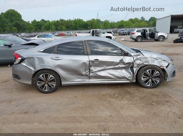 19XFC1F32HE032282 2017 HONDA CIVIC Gray Вид задньої частини салону
