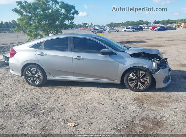 19XFC1F46HE009094 2017 HONDA CIVIC Серебряный Вид задней части салона