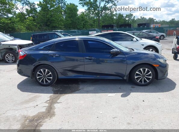 19XFC2F50JE022640 2018 HONDA CIVIC Blue Սալոնի հետևի տեսք