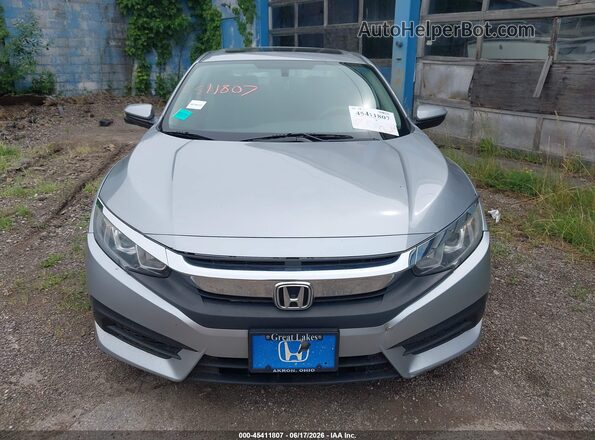 19XFC2F74HE046984 2017 HONDA CIVIC Silver Vista interior trasera