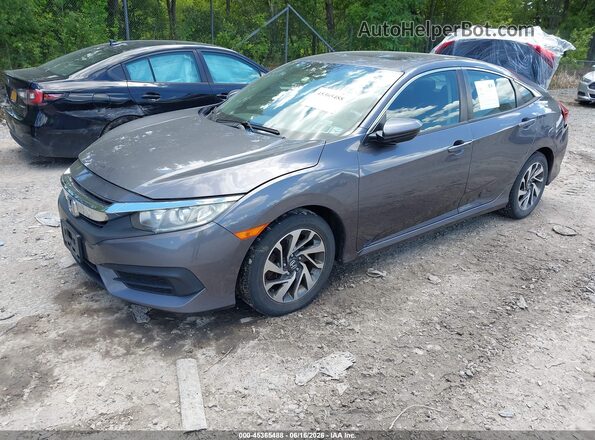 19XFC2F77GE202787 2016 HONDA CIVIC Gray Vista tres cuartos delantera izquierda
