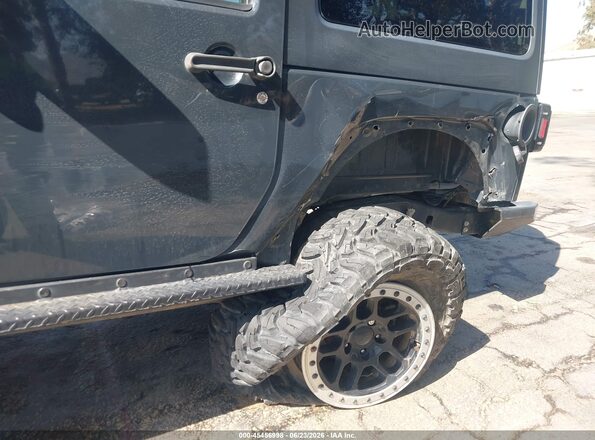 1C4BJWCG8GL235059 2016 JEEP WRANGLER Gray Front view