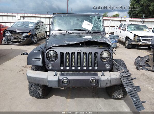 1C4BJWDG0GL215452 2016 JEEP WRANGLER UNLIMITED Gray Вид спереду