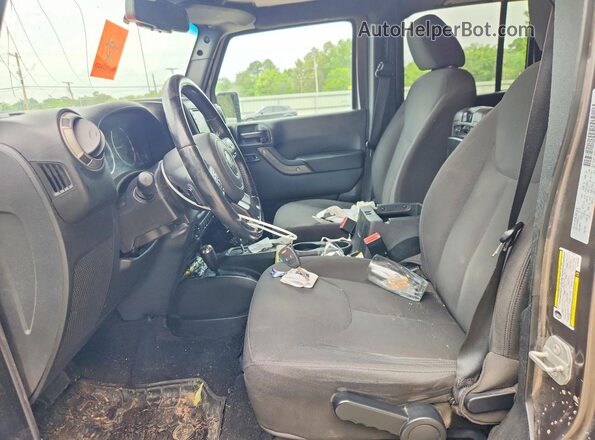 1C4BJWDG0GL287865 2016 JEEP WRANGLER Gray Front interior view