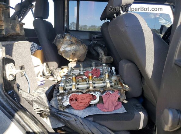 1C4BJWDG2GL178842 2016 JEEP WRANGLER Черный Вид задней части салона