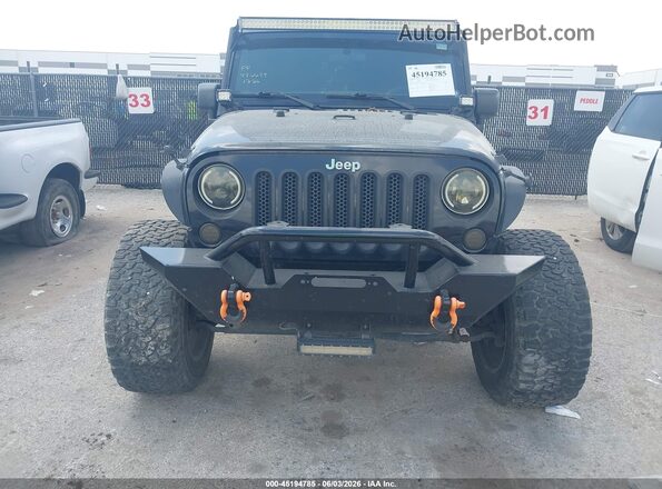 1C4BJWDG2GL344129 2016 JEEP WRANGLER UNLIMITED Black Вид щитка приладів