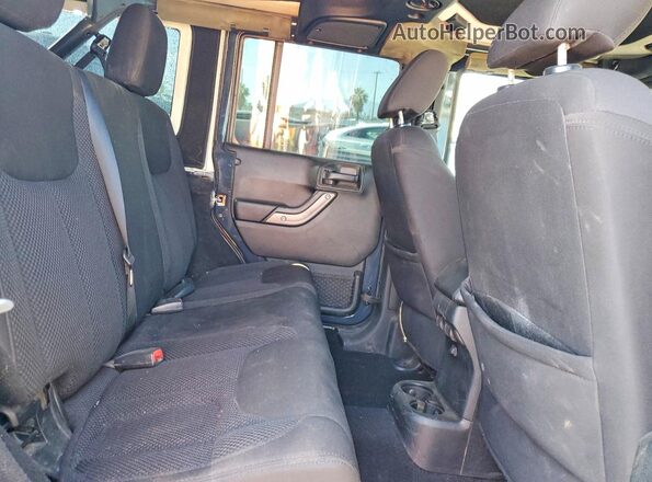1C4BJWDG2HL669557 2017 JEEP WRANGLER Gray Rear interior view