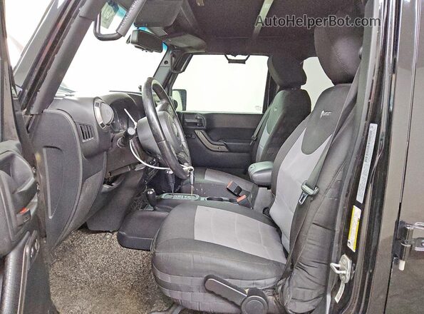 1C4BJWDG8GL228594 2016 JEEP WRANGLER Black Front interior view