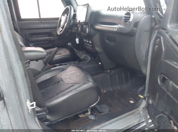 1C4BJWDGXGL270636 2016 JEEP WRANGLER UNLIMITED Gray Vista interior delantera