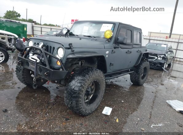 1C4BJWDGXGL270636 2016 JEEP WRANGLER UNLIMITED Gray Vista tres cuartos delantera izquierda
