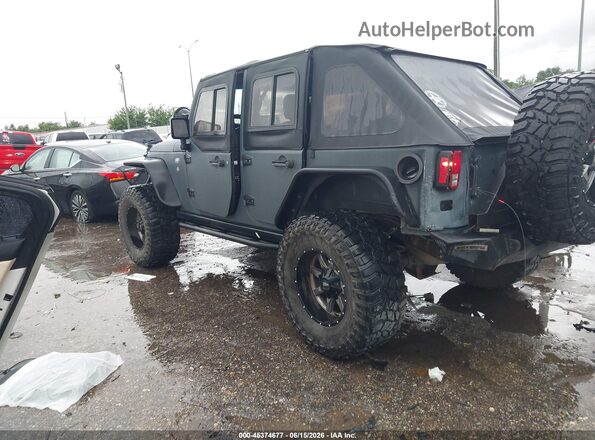 1C4BJWDGXGL270636 2016 JEEP WRANGLER UNLIMITED Gray Trasero izquierdo