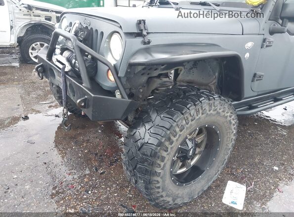 1C4BJWDGXGL270636 2016 JEEP WRANGLER UNLIMITED Gray Vista frontal
