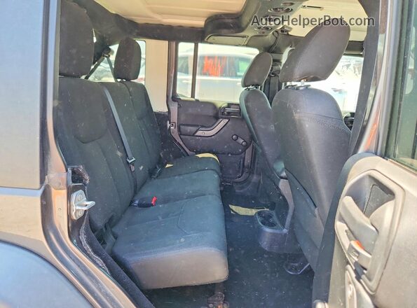 1C4BJWDGXGL335615 2016 JEEP WRANGLER Black Rear seats view
