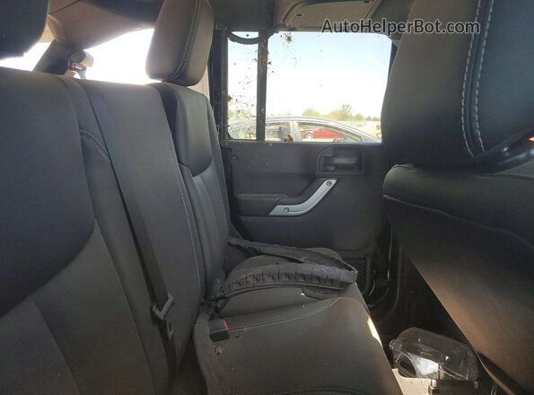 1C4BJWFGXGL298109 2016 JEEP WRANGLER Black Հետևի նստատեղերի տեսք