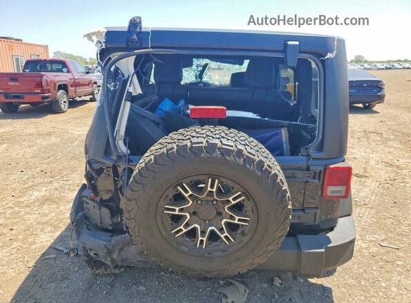 1C4BJWFGXGL298109 2016 JEEP WRANGLER Black Հետևի տեսք
