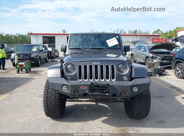 1C4HJWEG4GL242680 2016 JEEP WRANGLER UNLIMITED Серый Вид щитка приборов