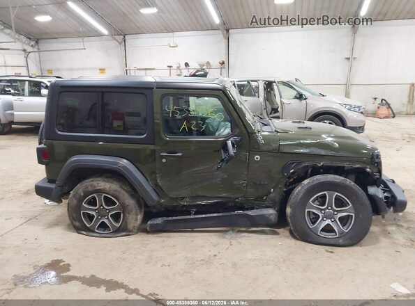 1C4HJXAG2PW602555 2023 JEEP WRANGLER Green Widok wnętrza z tyłu