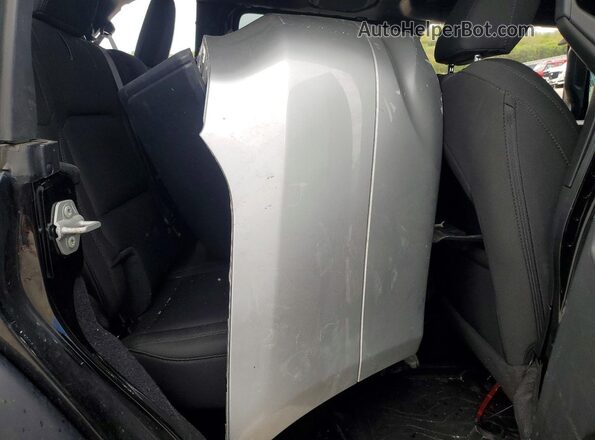 1C4HJXDG2MW775290 2021 JEEP WRANGLER Black Widok wnętrza z tyłu