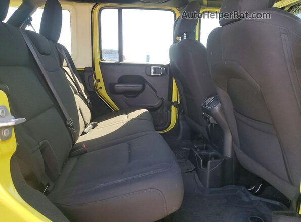 1C4HJXDG3PW523469 2023 JEEP WRANGLER Yellow Rear seats view