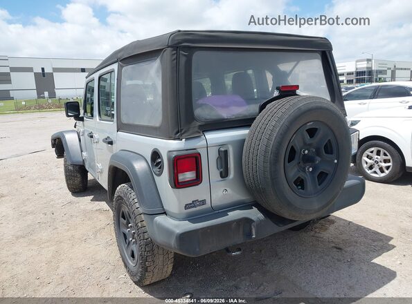 1C4HJXDG4PW659674 2023 JEEP WRANGLER Silver Trasero izquierdo