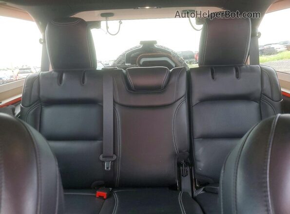 1C4HJXDGXPW643799 2023 JEEP WRANGLER Orange Rear seats view
