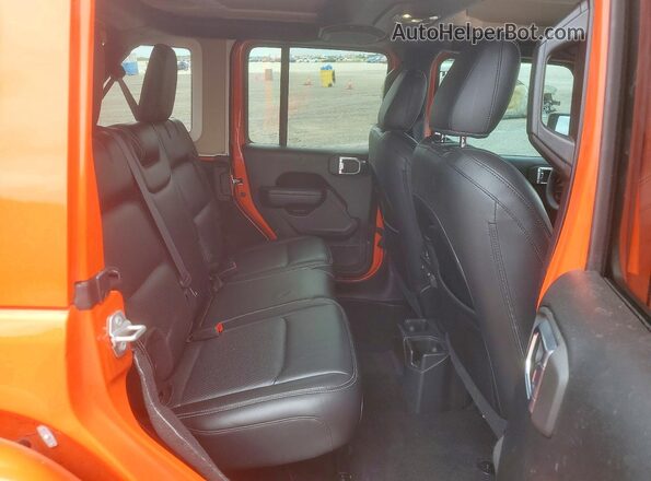 1C4HJXDGXPW643799 2023 JEEP WRANGLER Orange Rear interior view