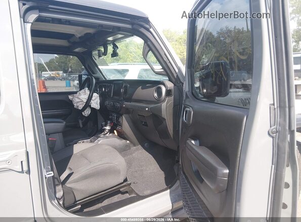 1C4HJXDM7PW534416 2023 JEEP WRANGLER Gray წინა სალონის ხედი