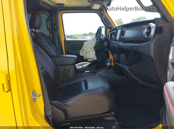 1C4HJXFG0KW614494 2019 JEEP WRANGLER UNLIMITED Yellow Vista interior delantera