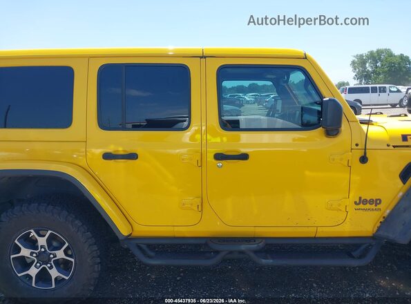 1C4HJXFG0KW614494 2019 JEEP WRANGLER UNLIMITED Yellow Vista interior trasera