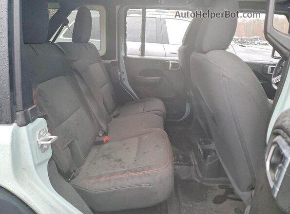 1C4HJXFG7PW560862 2023 JEEP WRANGLER Green Widok tylnych siedzeń