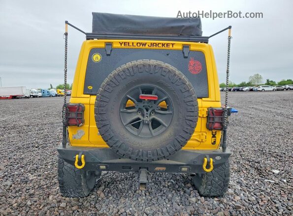 1C4HJXFG9JW308537 2018 JEEP WRANGLER Yellow Հետևի տեսք