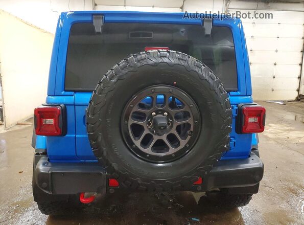 1C4HJXFN7PW637602 2023 JEEP WRANGLER Blue Вид ззаду
