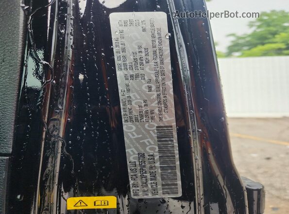 1C4JJXP65PW557062 2023 JEEP WRANGLER Black VIN sticker view