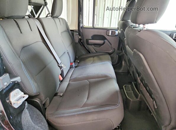 1C4JJXR64PW501028 2023 JEEP WRANGLER Черный Вид задней части салона