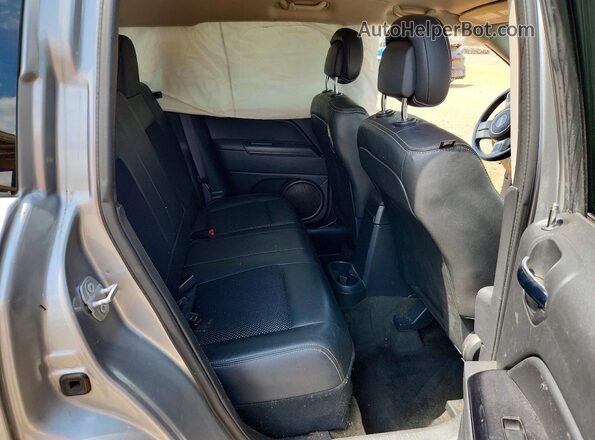 1C4NJCBAXGD803055 2016 JEEP COMPASS Silver Սալոնի հետևի տեսք