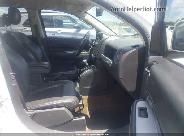 1C4NJCEA1GD599399 2016 JEEP COMPASS White Front interior view