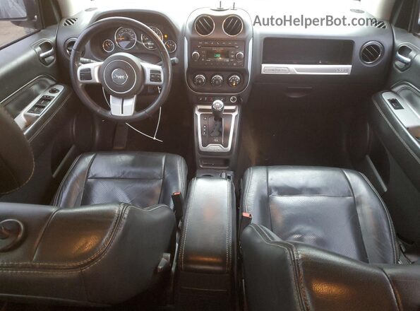 1C4NJCEA8GD716329 2016 JEEP COMPASS Black Dashboard view