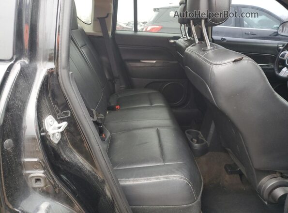 1C4NJCEA8GD716329 2016 JEEP COMPASS Black Rear interior view