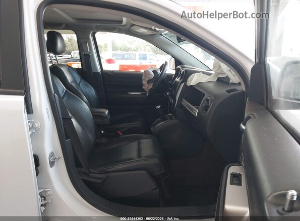 1C4NJCEAXGD676500 2016 JEEP COMPASS White Front interior view