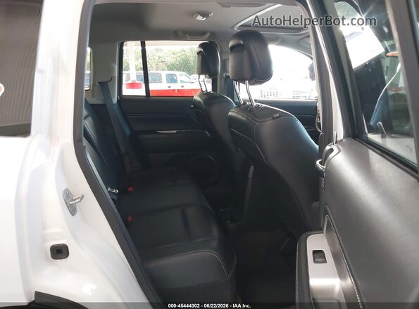 1C4NJCEAXGD676500 2016 JEEP COMPASS White VIN sticker view