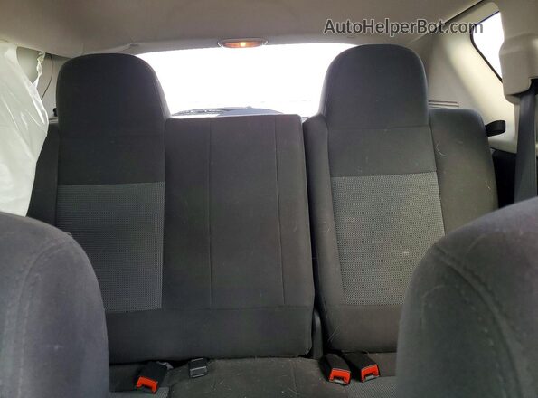 1C4NJDBB1GD519960 2016 JEEP COMPASS Black Rear seats view