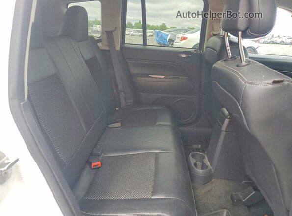 1C4NJDEB1GD617110 2016 JEEP COMPASS White Rear interior view