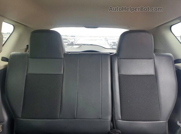 1C4NJDEB1GD617110 2016 JEEP COMPASS White Rear seats view