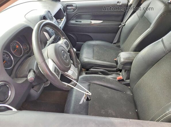 1C4NJDEB1GD718941 2016 JEEP COMPASS Charcoal Widok wnętrza z przodu