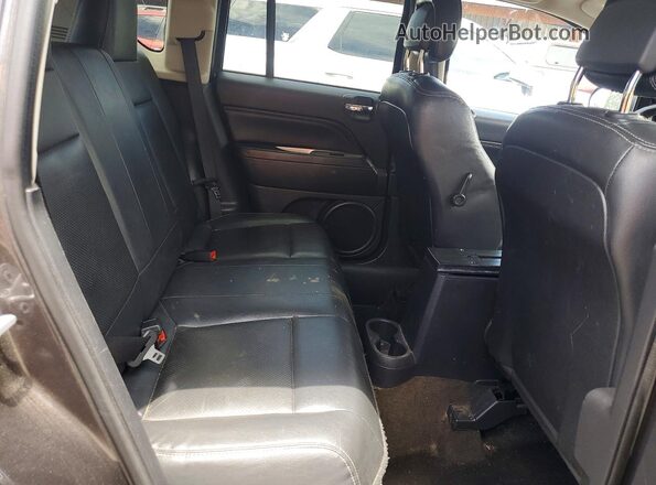 1C4NJDEB5GD559325 2016 JEEP COMPASS Gray Rear interior view